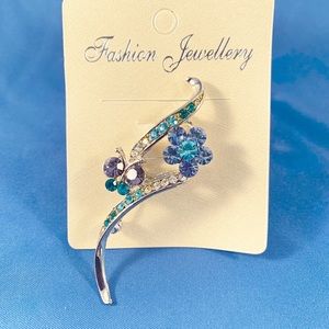 Flower and butterfly pin